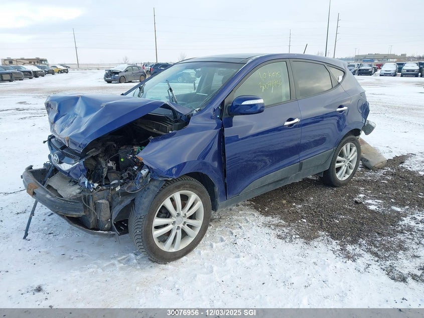 KM8JUCAC9DU617104 2013 HYUNDAI TUCSON photo no. 2