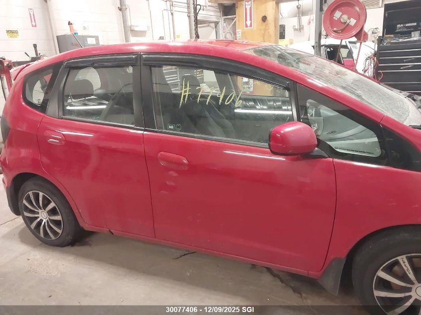 2009 Honda Fit Lx VIN: JHMGE88579S812331 Lot: 30077406