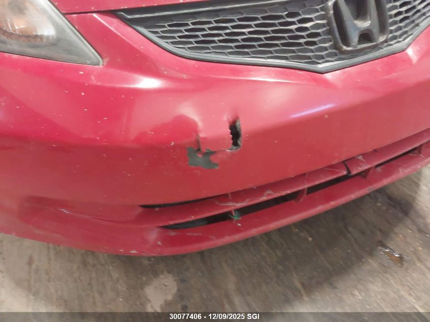 2009 Honda Fit Lx VIN: JHMGE88579S812331 Lot: 30077406