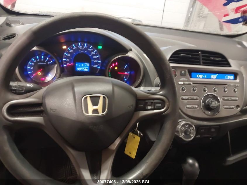 2009 Honda Fit Lx VIN: JHMGE88579S812331 Lot: 30077406