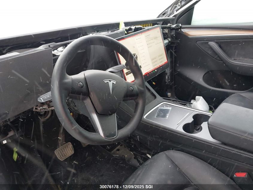 2023 Tesla Model Y VIN: 7SAYGDEE0PF771468 Lot: 30076178