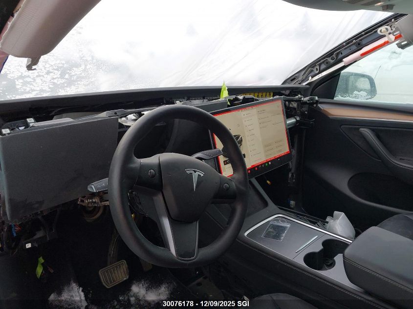 2023 Tesla Model Y VIN: 7SAYGDEE0PF771468 Lot: 30076178