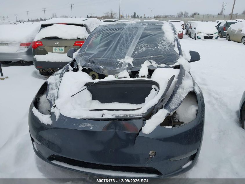 2023 Tesla Model Y VIN: 7SAYGDEE0PF771468 Lot: 30076178