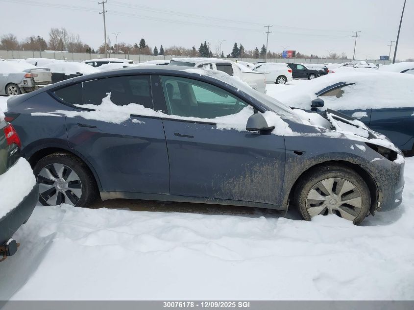 2023 Tesla Model Y VIN: 7SAYGDEE0PF771468 Lot: 30076178