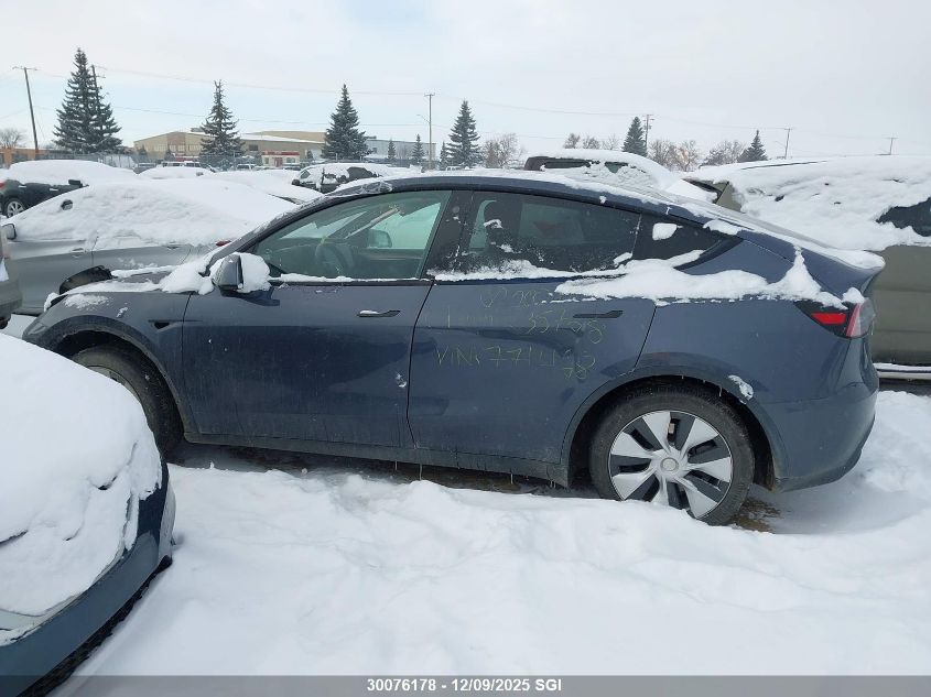 2023 Tesla Model Y VIN: 7SAYGDEE0PF771468 Lot: 30076178
