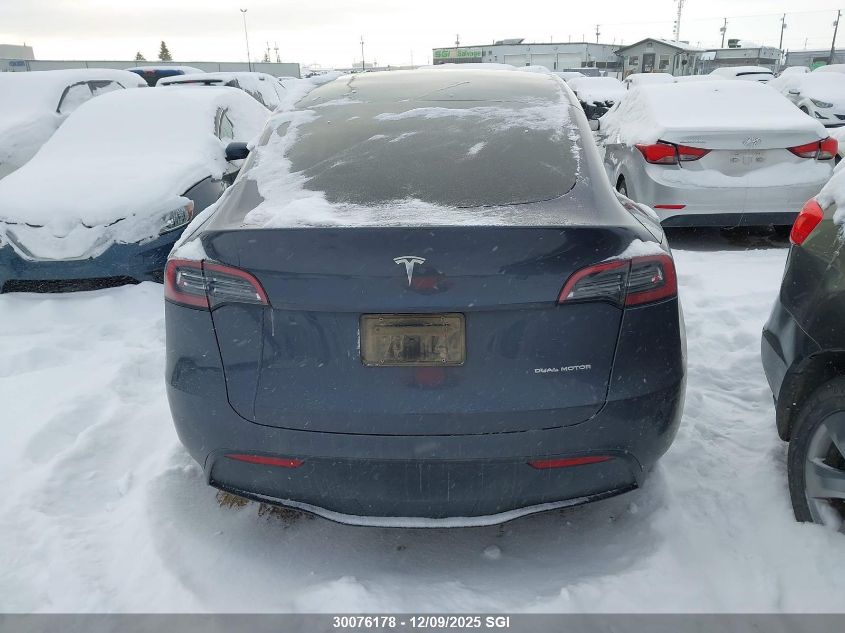 2023 Tesla Model Y VIN: 7SAYGDEE0PF771468 Lot: 30076178