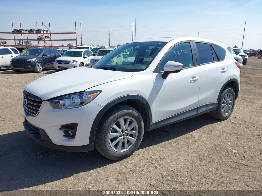2016 Mazda CX-5, Град, IAAI, VIN JM3KE4CY6G0842829 — фото 2