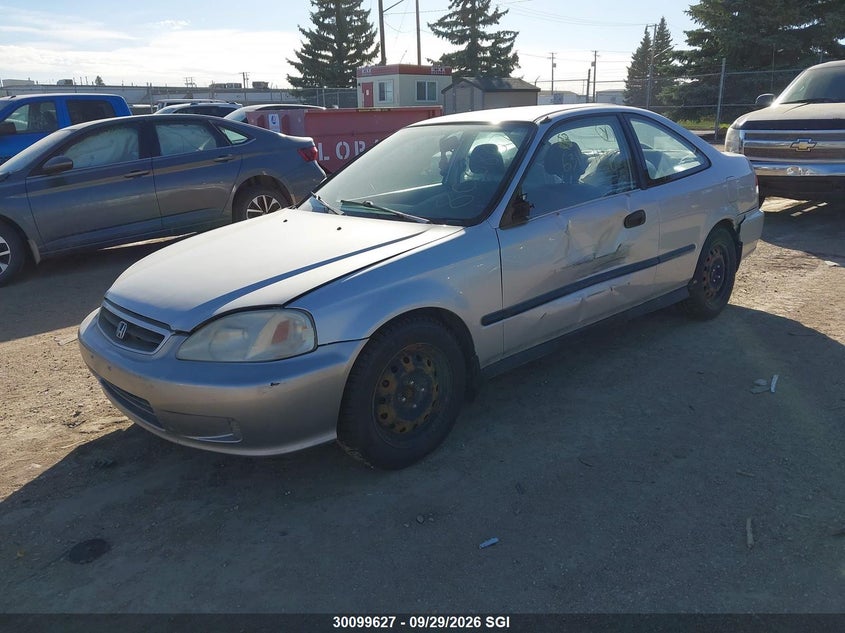 1999 Honda Civic Dx, Left Side, IAAI, VIN 1HGEJ6263XL806867 — photo 2
