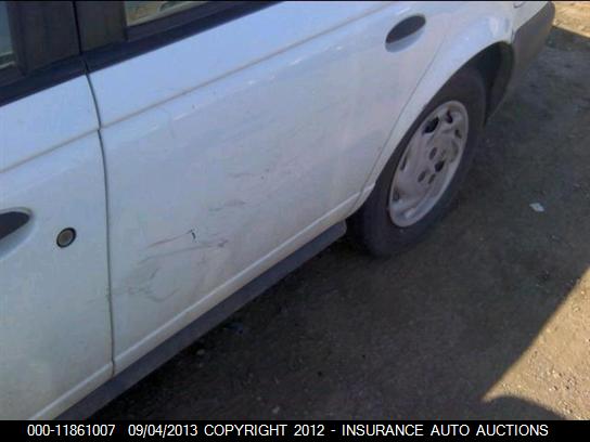 1999 Saturn Sl VIN: 1G8ZF5281XZ130231 Lot: 11861007