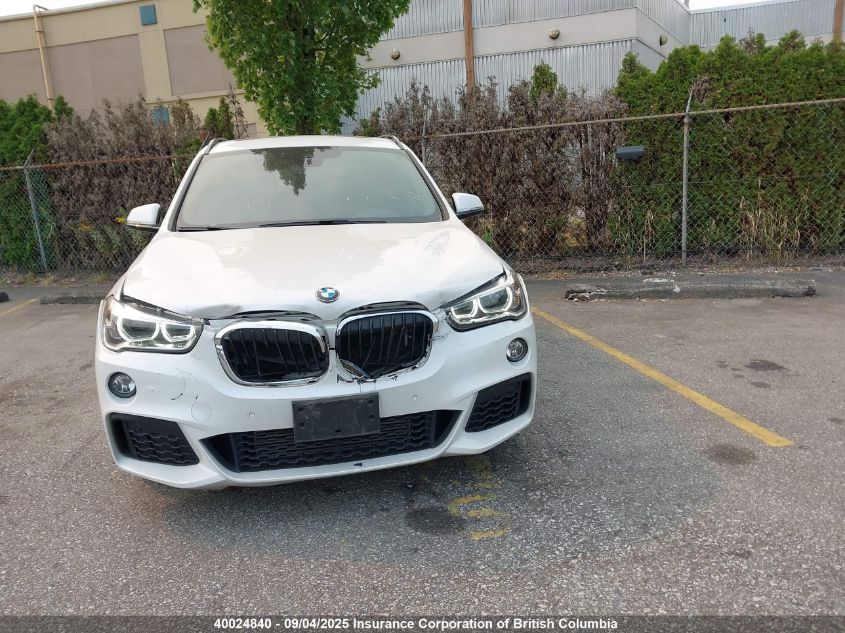 2018 BMW X1 VIN: WBXHT3C33J5K20774 Lot: 40024840