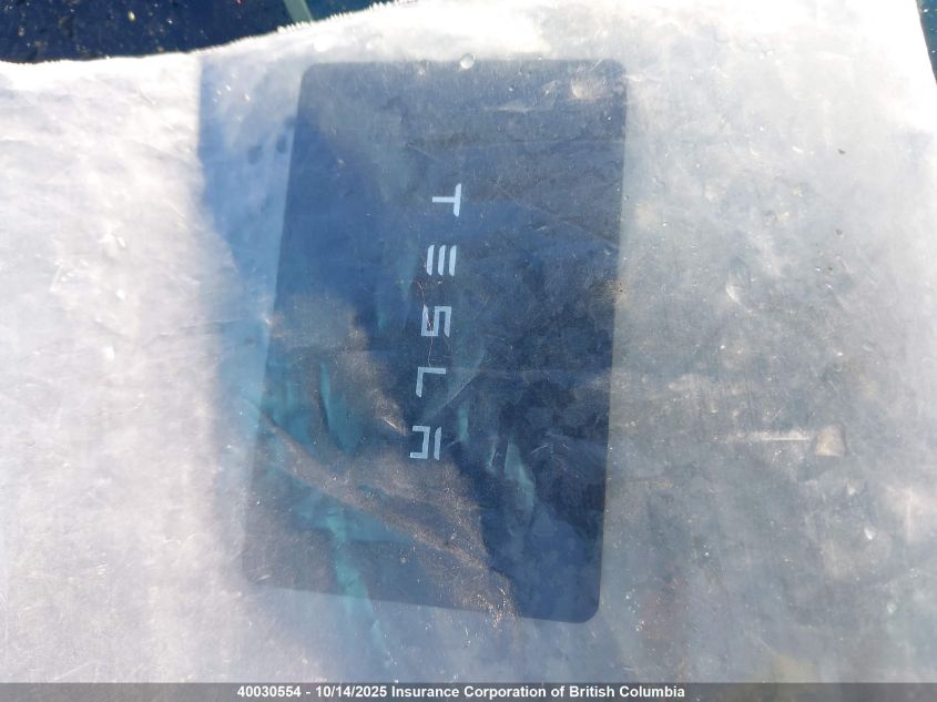 2023 Tesla Model Y VIN: 7SAYGDEE0PF776864 Lot: 40030554