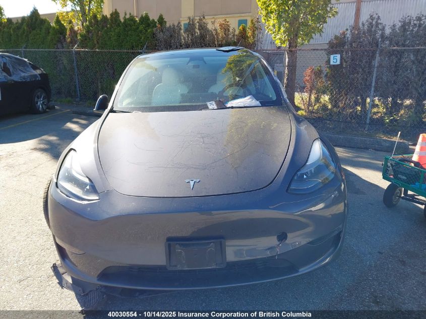 2023 Tesla Model Y VIN: 7SAYGDEE0PF776864 Lot: 40030554