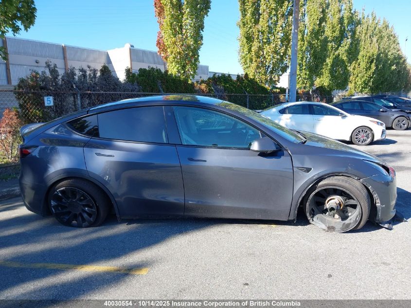 2023 Tesla Model Y VIN: 7SAYGDEE0PF776864 Lot: 40030554