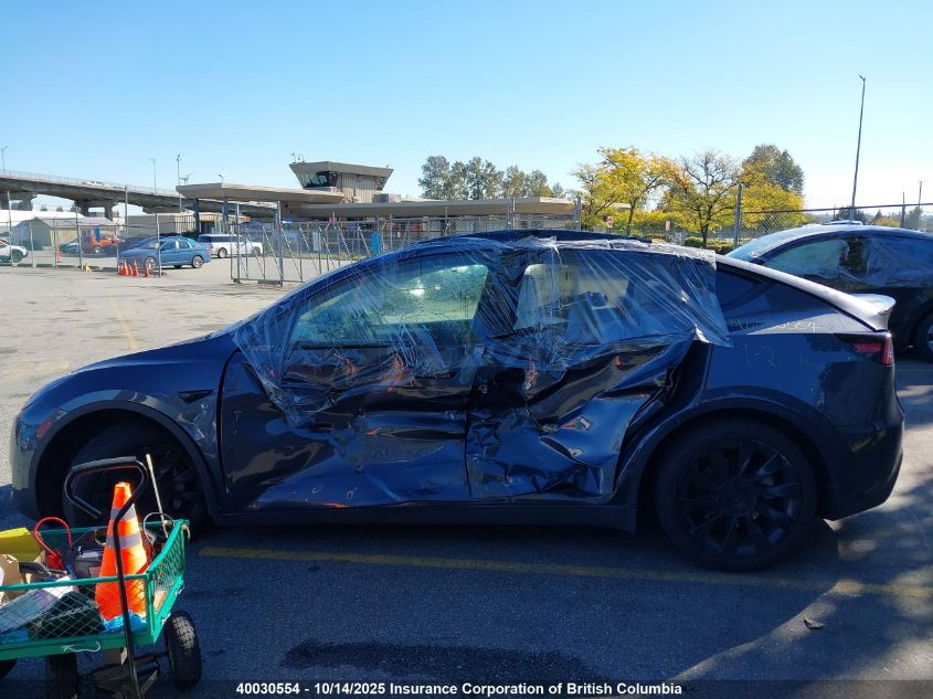 2023 Tesla Model Y VIN: 7SAYGDEE0PF776864 Lot: 40030554