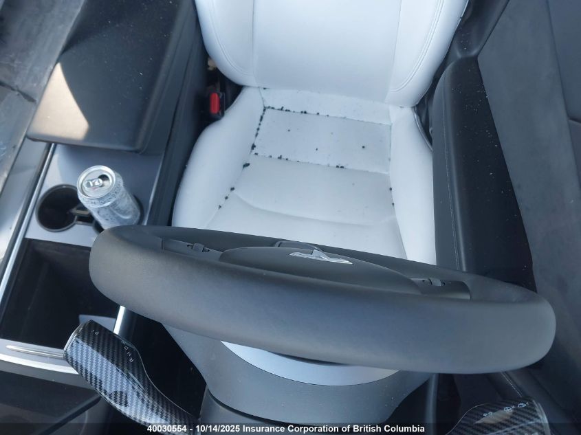 2023 Tesla Model Y VIN: 7SAYGDEE0PF776864 Lot: 40030554