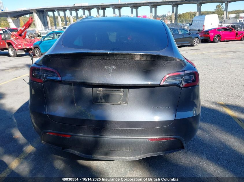 2023 Tesla Model Y VIN: 7SAYGDEE0PF776864 Lot: 40030554