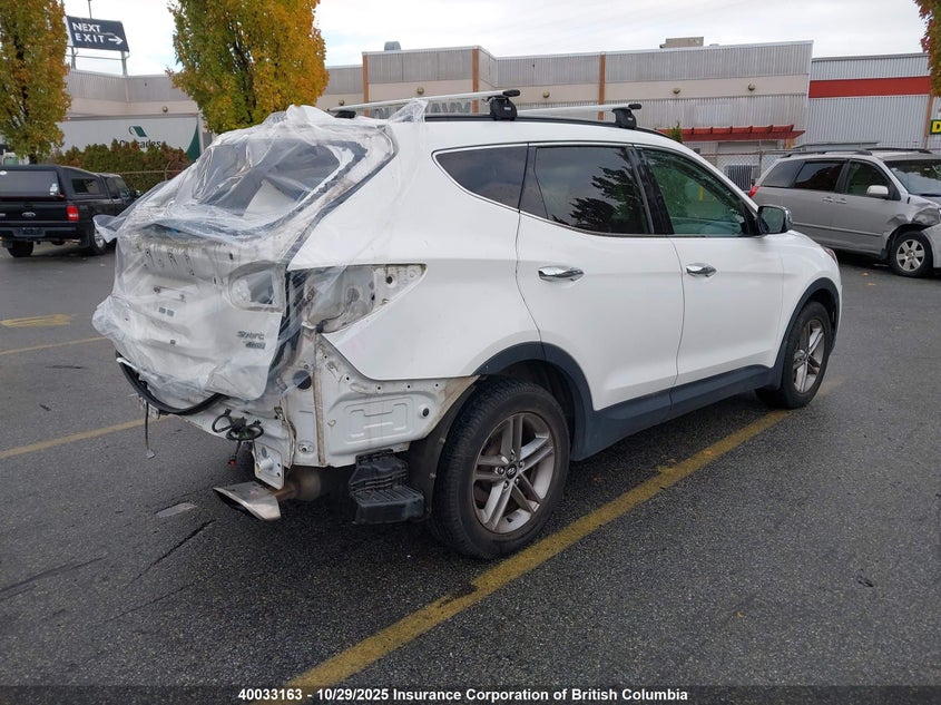 5XYZUDLB9HG401648 2017 HYUNDAI SANTA FE photo no. 4