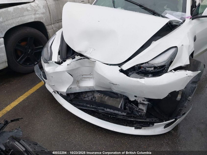 2023 Tesla Model 3 VIN: 5YJ3E1EB1PF699052 Lot: 40032204