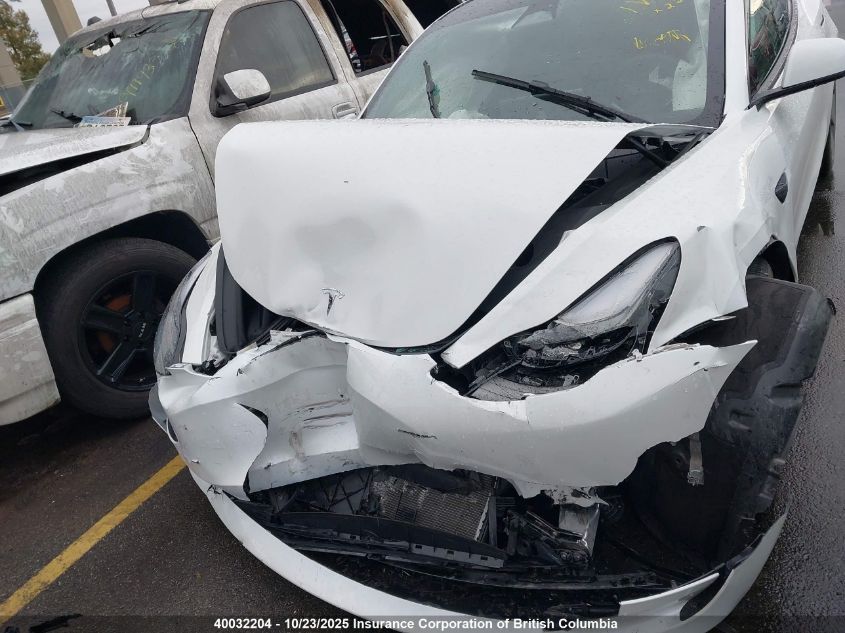 2023 Tesla Model 3 VIN: 5YJ3E1EB1PF699052 Lot: 40032204