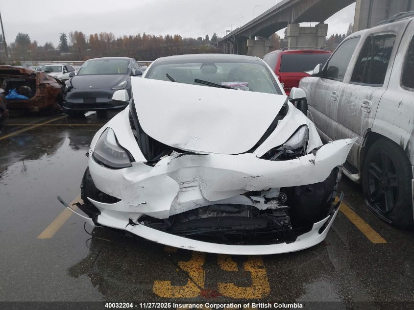 2023 Tesla Model 3 VIN: 5YJ3E1EB1PF699052 Lot: 40032204