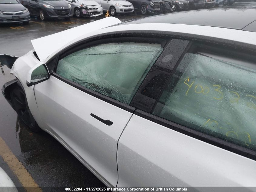 2023 Tesla Model 3 VIN: 5YJ3E1EB1PF699052 Lot: 40032204