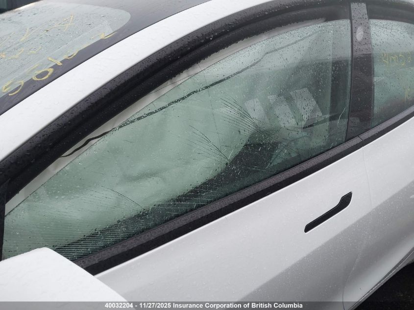 2023 Tesla Model 3 VIN: 5YJ3E1EB1PF699052 Lot: 40032204