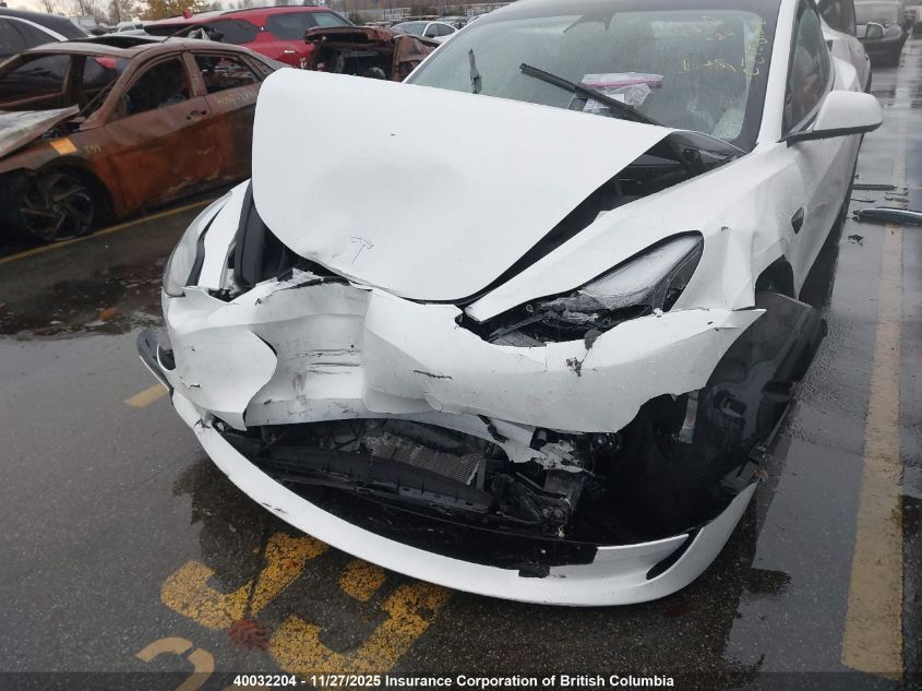 2023 Tesla Model 3 VIN: 5YJ3E1EB1PF699052 Lot: 40032204