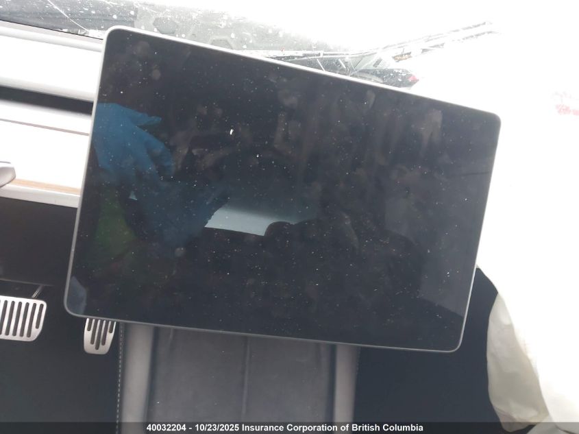 2023 Tesla Model 3 VIN: 5YJ3E1EB1PF699052 Lot: 40032204