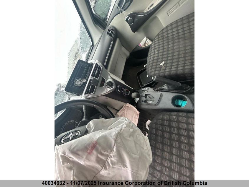 2012 Scion Iq VIN: JTNJJXB03CJ014802 Lot: 40034632