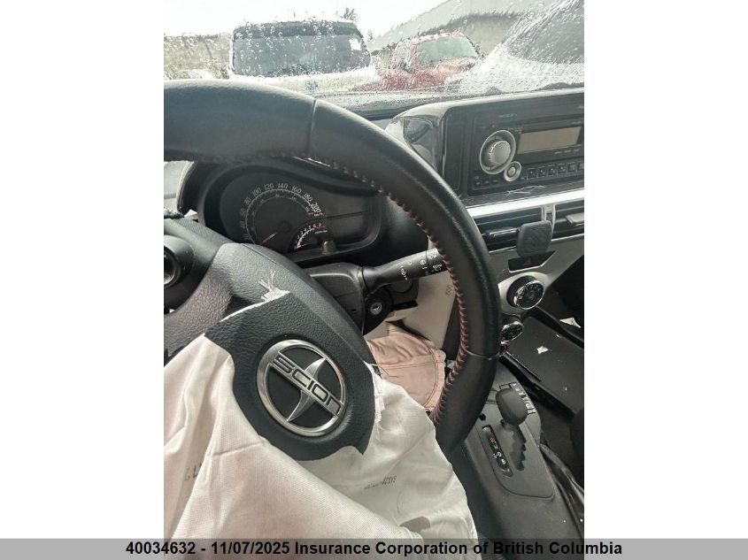 2012 Scion Iq VIN: JTNJJXB03CJ014802 Lot: 40034632