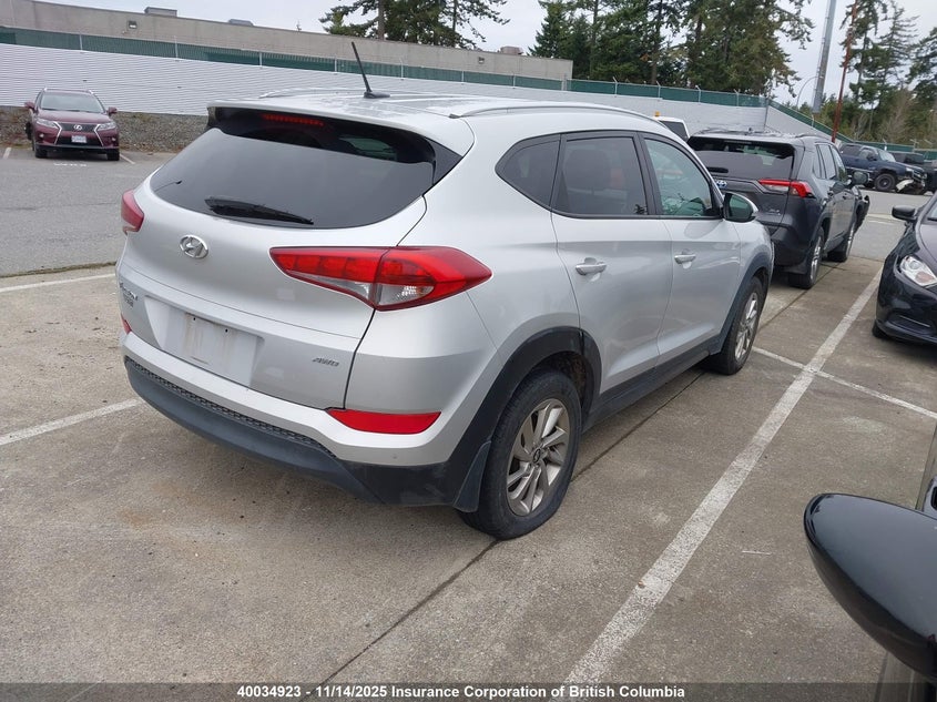 KM8J3CA41GU108754 2016 HYUNDAI TUCSON photo no. 4