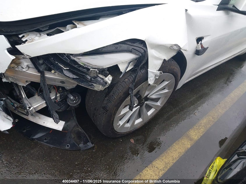 2023 Tesla Model 3 VIN: 5YJ3E1EA8PF559099 Lot: 40034497