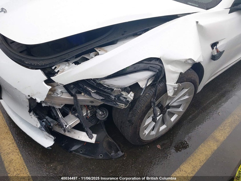 2023 Tesla Model 3 VIN: 5YJ3E1EA8PF559099 Lot: 40034497