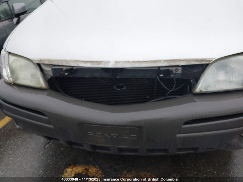 1GMDU03EX2D324349 2002 PONTIAC MONTANA photo no. 6