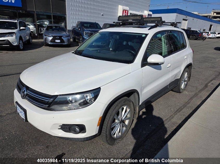 WVGHV7AX5DW547143 2013 VOLKSWAGEN TIGUAN photo no. 2