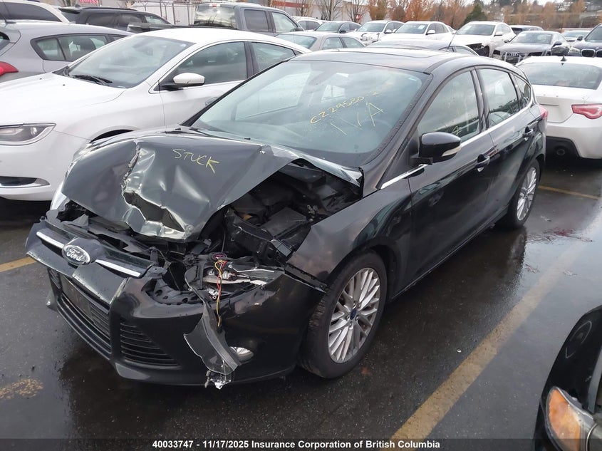 1FAHP3M20CL379764 2012 FORD FOCUS photo no. 2