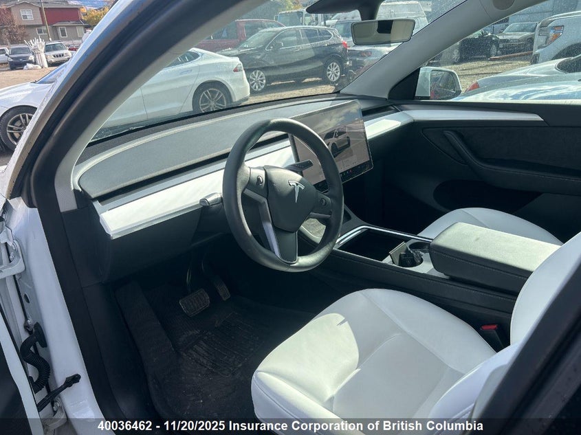 2023 Tesla Model Y VIN: 7SAYGDEE0PF619982 Lot: 40036462