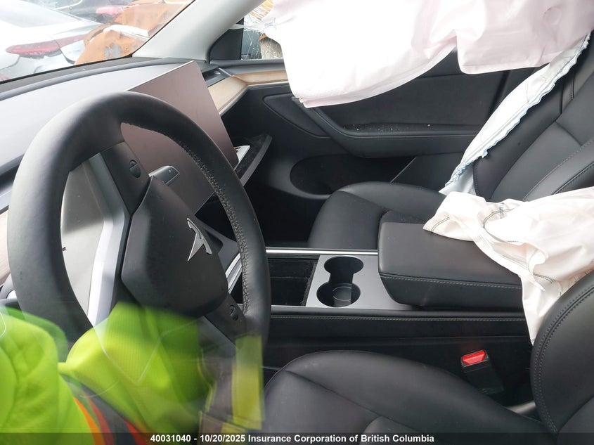 2023 Tesla Model Y VIN: 7SAYGDEE2PF772301 Lot: 40031040