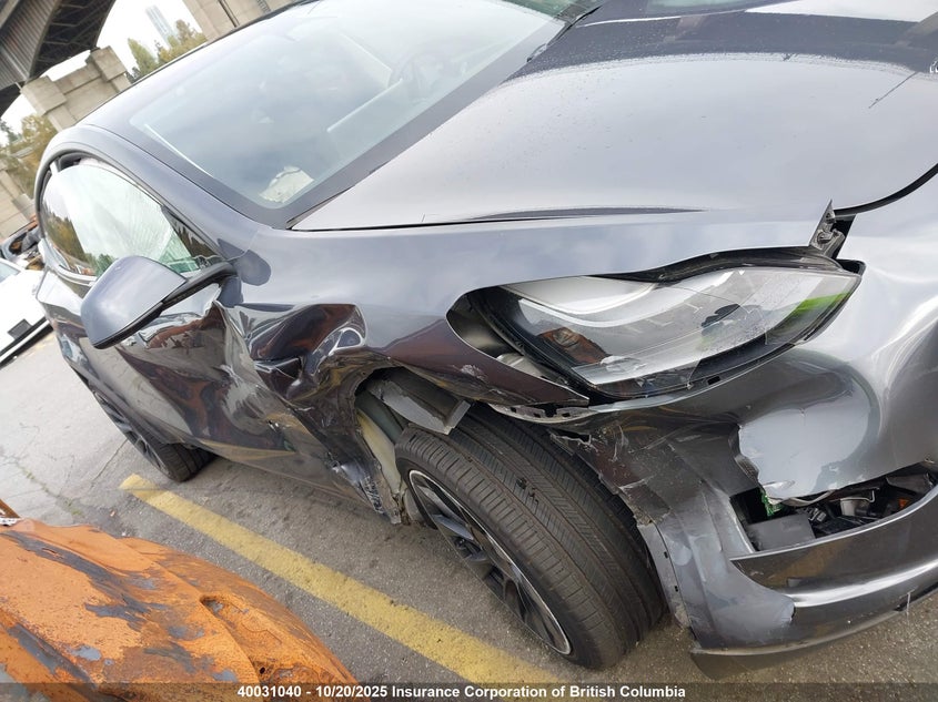 2023 Tesla Model Y VIN: 7SAYGDEE2PF772301 Lot: 40031040