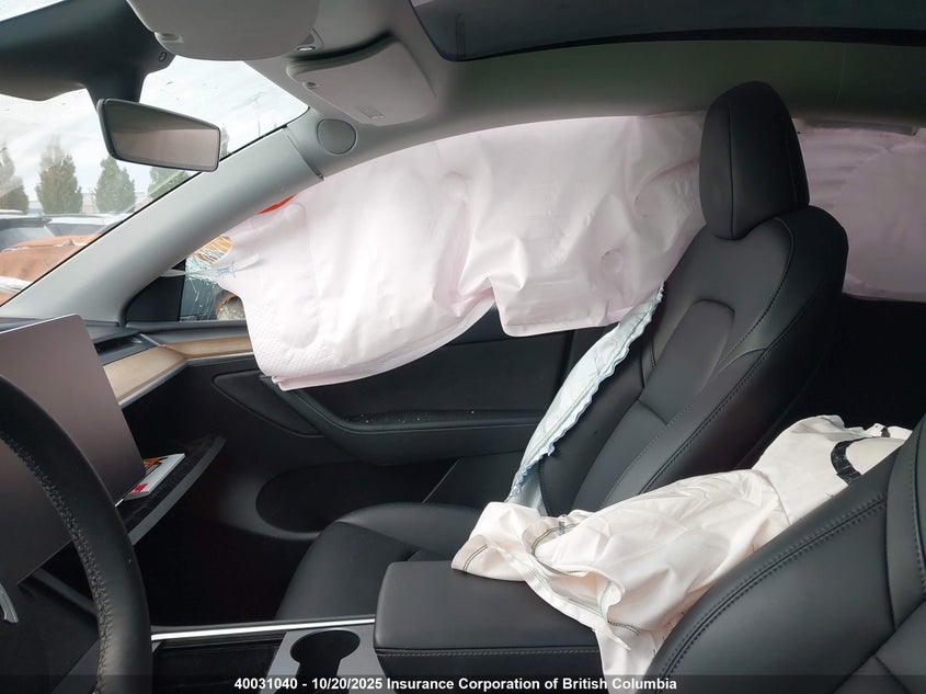 2023 Tesla Model Y VIN: 7SAYGDEE2PF772301 Lot: 40031040