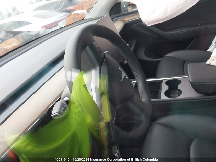 2023 Tesla Model Y VIN: 7SAYGDEE2PF772301 Lot: 40031040