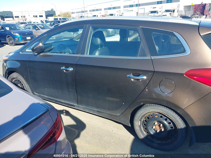 KNAHU8A34F7080396 2015 KIA RONDO photo no. 14