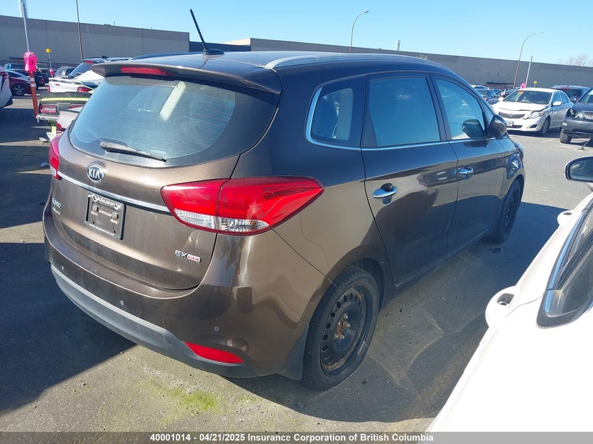 KNAHU8A34F7080396 2015 KIA RONDO photo no. 4