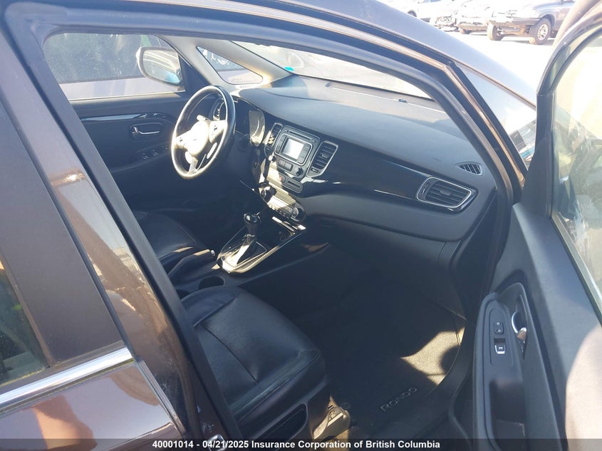 KNAHU8A34F7080396 2015 KIA RONDO photo no. 5