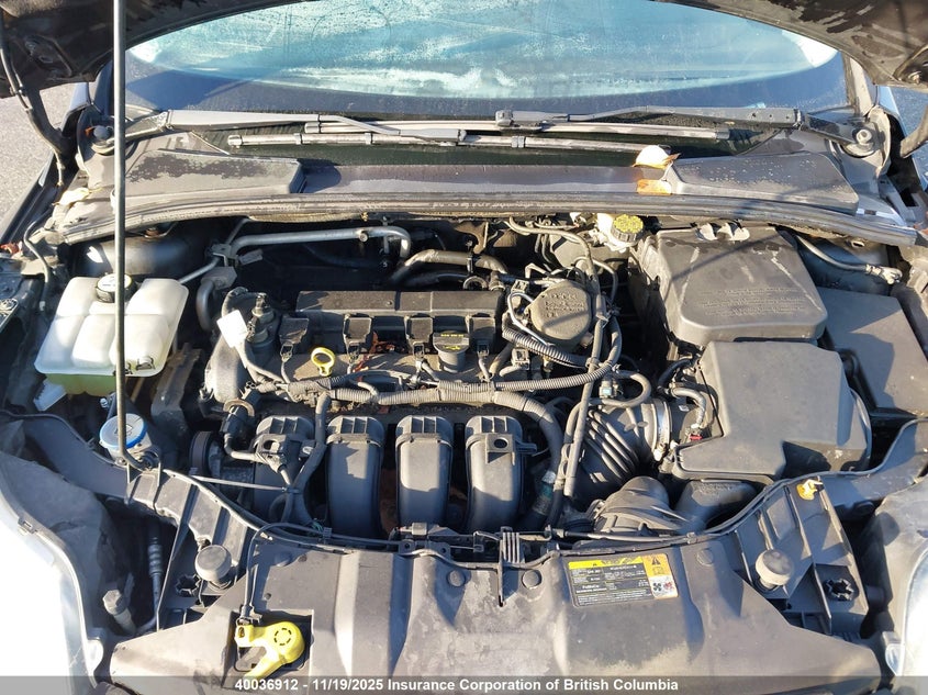 1FAHP3H23CL388243 2012 FORD FOCUS photo no. 10