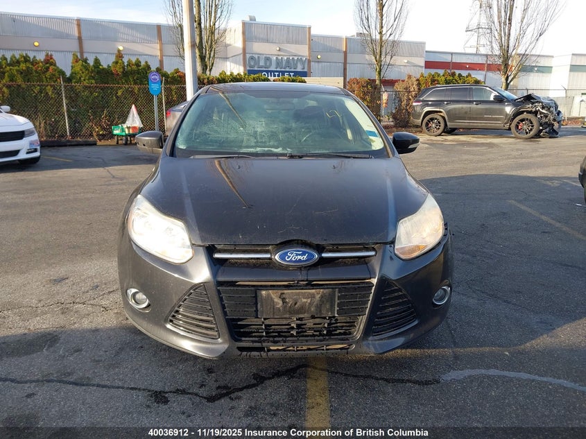 1FAHP3H23CL388243 2012 FORD FOCUS photo no. 12