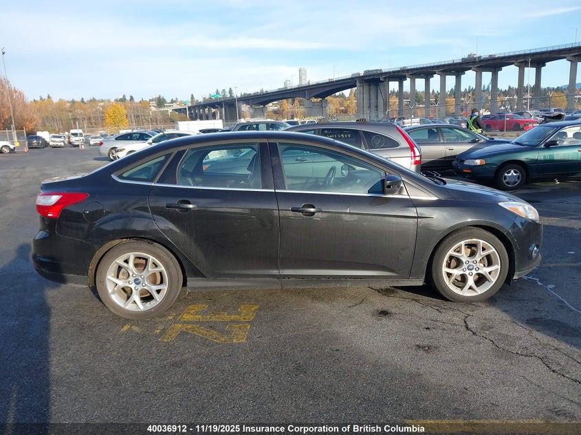 1FAHP3H23CL388243 2012 FORD FOCUS photo no. 13