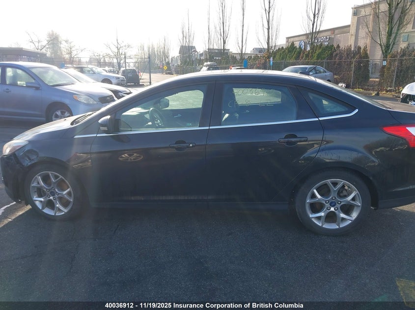 1FAHP3H23CL388243 2012 FORD FOCUS photo no. 14