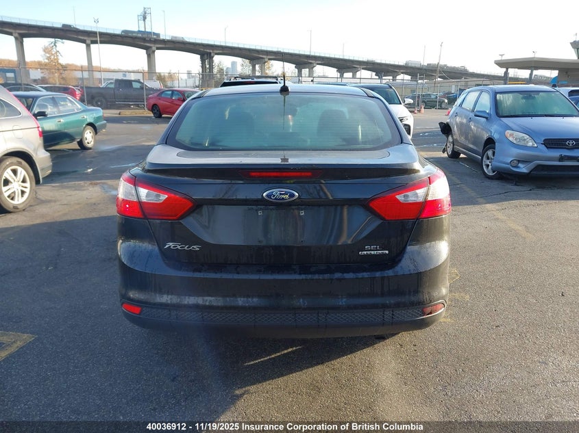 1FAHP3H23CL388243 2012 FORD FOCUS photo no. 16