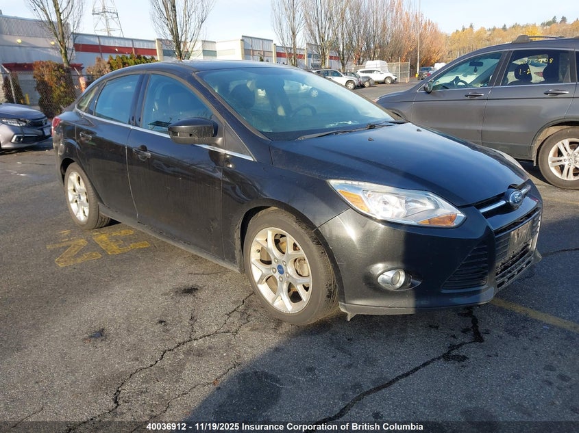 1FAHP3H23CL388243 2012 FORD FOCUS photo no. 9